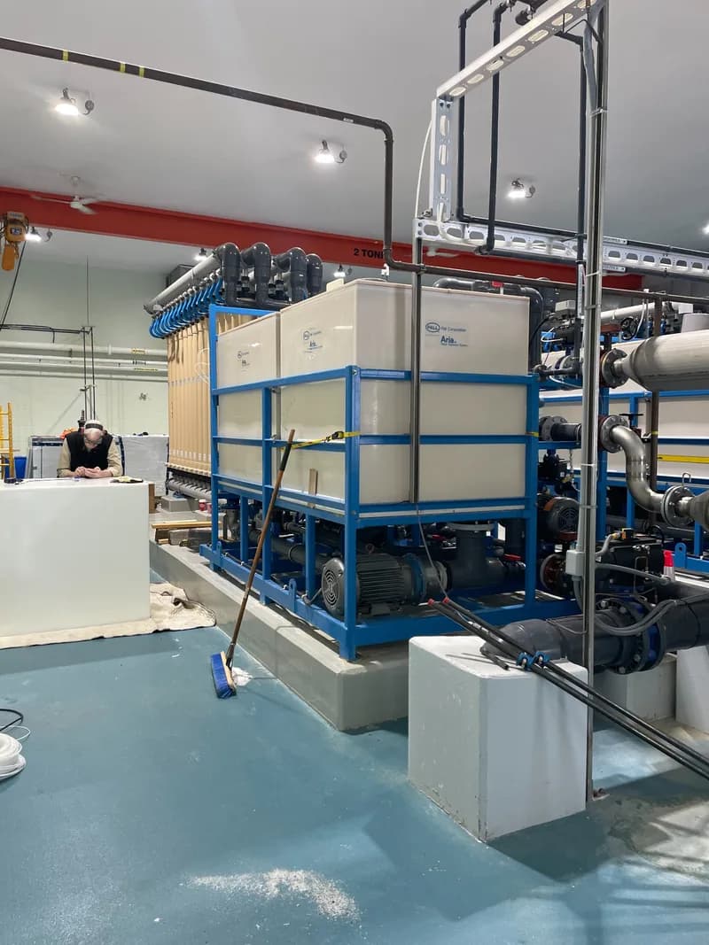 Large rectangular process tanks integrated into a water treatment system