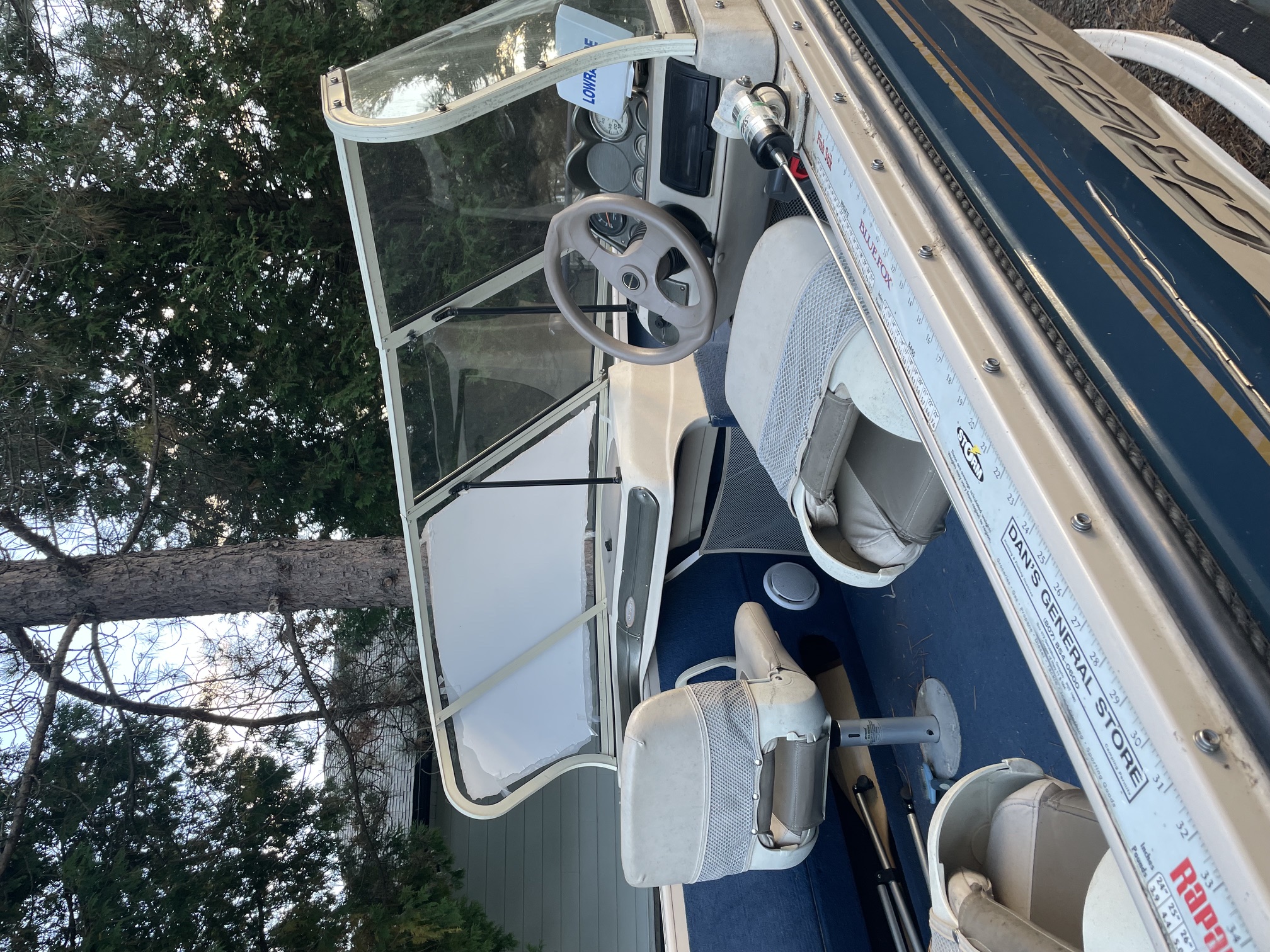 Clear wraparound windshield installed on a motorboat
