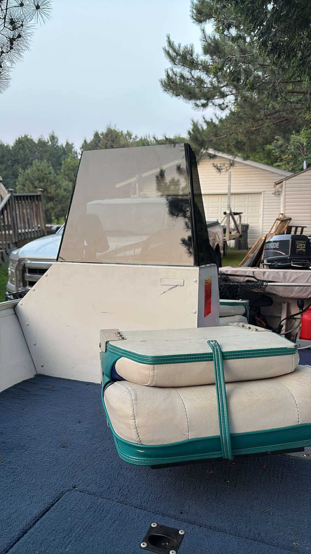 Large clear windshield installed on a pontoon boat console